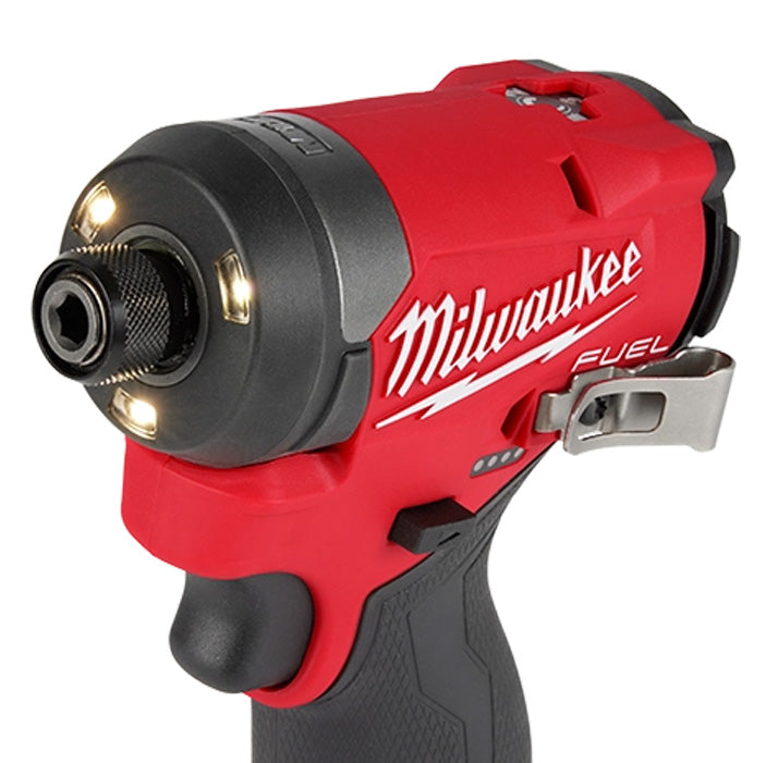 Milwaukee M12 Fuel 1/4" Impact Driver in red and black tool with LED lights and textured grip.