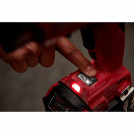 Milwaukee M18 Fuel Drywall Screw Gun 2866-20 with red body and finger pressing button on tool.